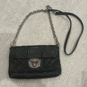 Calvin Klein cross body purse. Black quilted. 8-1/2” X 5”